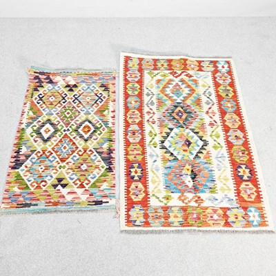 Lot 605 - A Persian kilim rug, with coloured diamonds,...