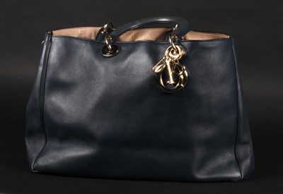 Lot 704A - A blue leather ladies handbag, inscribed...