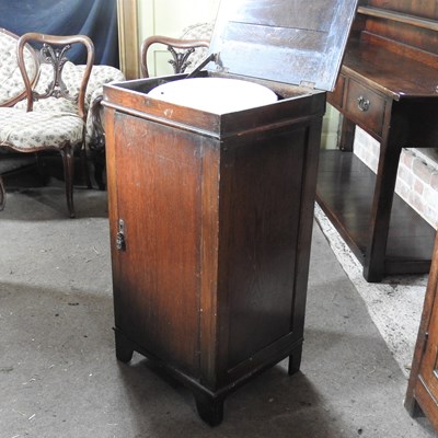 Lot 50 - A 1920's oak enclosed washstand