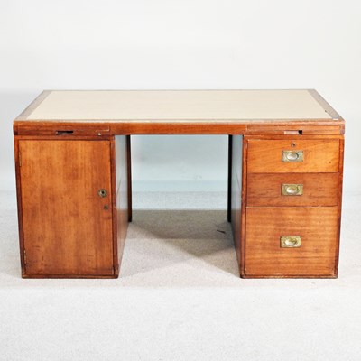 Lot 82 - A mid 20th century military style teak desk,...