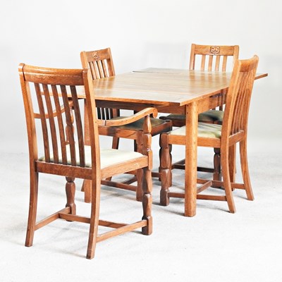 Lot 155 - A 1920s oak draw-leaf extending dining table,...