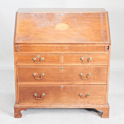 Lot 758 - A 19th century mahogany and inlaid bureau,...
