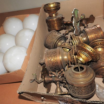 Lot 336 - A collection of six brass oil wall lights