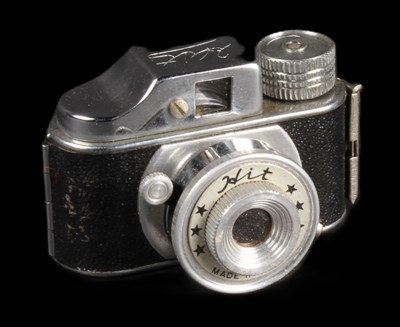 Lot 706 - A Hit micro camera, in yellow case