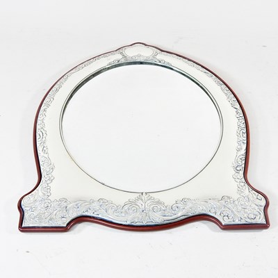 Lot 666 - A modern silver framed wall mirror, with an...