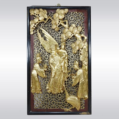 Lot 300 - A Chinese carved wood and gilt decorated panel,...