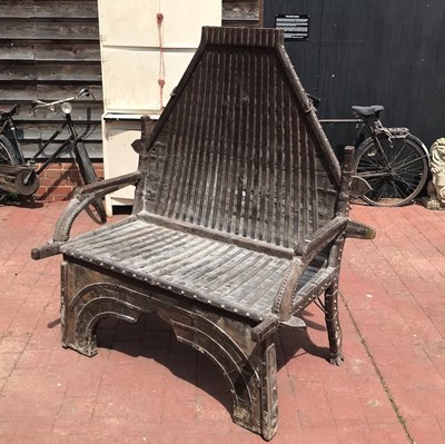 Lot 100 - An Indian hardwood and metal bound seat