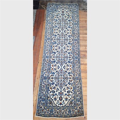 Lot 670 - A central Persian Kashan runner, decorated...