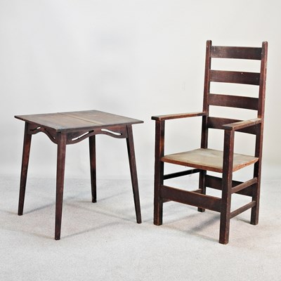 Lot 291 - An Arts and Crafts oak ladderback armchair, in...