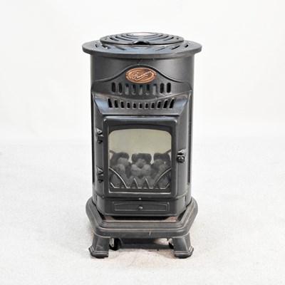 Lot 183 - A Provence log effect gas heater, 78cm high