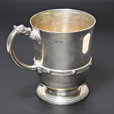 Lot 60 - An early 20th century silver mug, with a...