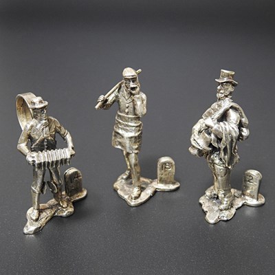 Lot 395 - Three miniature sterling silver menu holders,...