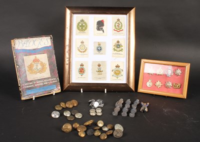 Lot 714 - A collection of militaria, including buttons,...