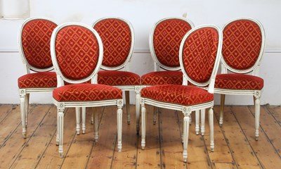 Lot 600 - A set of six French style white painted dining...