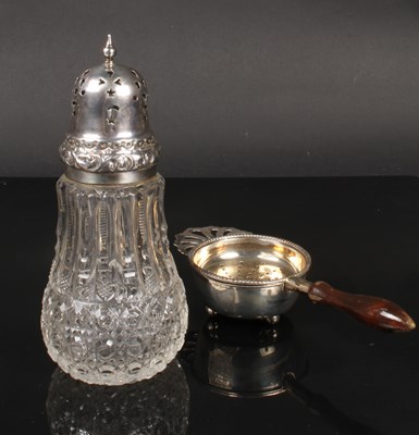 Lot 58 - An Elizabeth II silver tea strainer,...