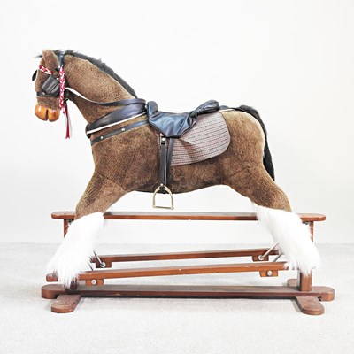 Lot 715 - A modern plush rocking horse, by Mamas and...