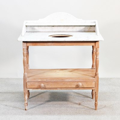 Lot 543 - A stripped pine washstand, on turned legs