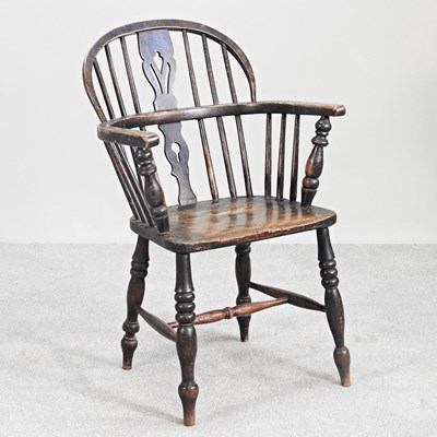 Lot 728 - A 19th century ash seated windsor armchair, on...