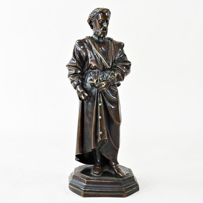 Lot 648 - A bronze statue of a gentleman, probably Saint...