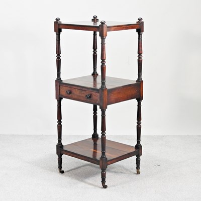 Lot 586 - A Regency rosewood three tier whatnot, united...