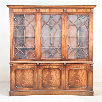 Lot 554 - A Reprodeaux Georgian style library bookcase,...