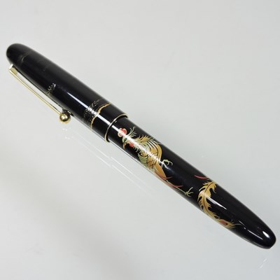 Lot 53 - A Namiki gilt and black lacquered fountain pen