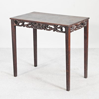 Lot 215 - An early 20th century Chinese carved oak side...