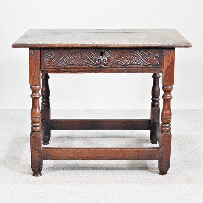 Lot 618 - An 18th century and later carved oak side...