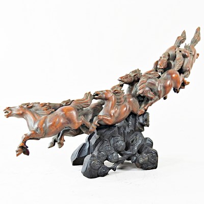 Lot 117 - A Chinese carved wooden sculpture of eight...