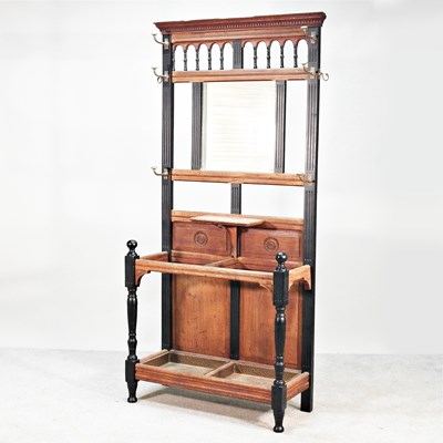 Lot 111 - An Edwardian mirror back hallstand, with drip...