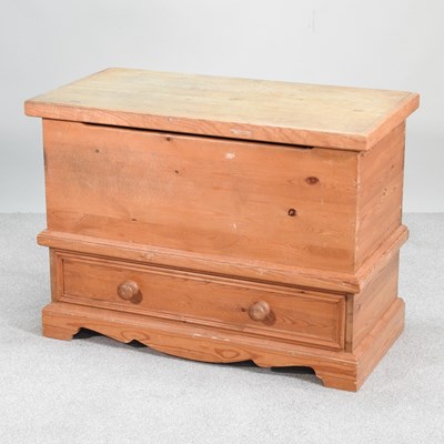 Lot 452 - A pine blanket box, with a hinged lid and...