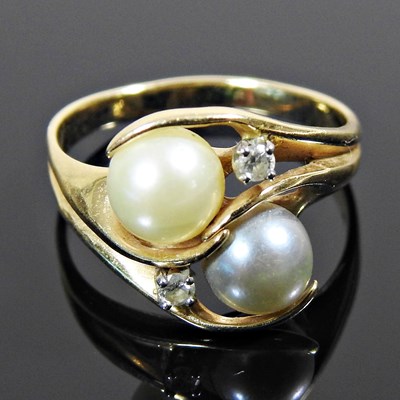 Lot 214 - A 14 carat gold two colour pearl and diamond...