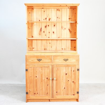 Lot 558 - A modern pine dresser, with a boarded plate rack