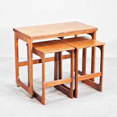 Lot 351 - A teak nest of three 1960s teak occasional...