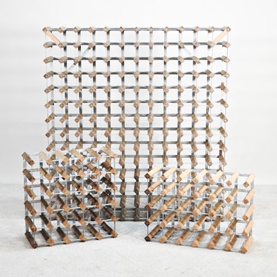 Lot 643 - A wine rack, 117cm wide, together with two...