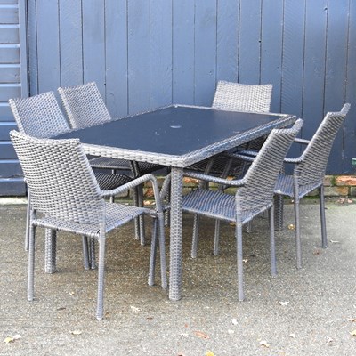Lot 263 - A rattan glass top garden table, 149cm wide,...