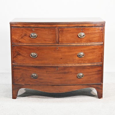 Lot 645 - A 19th century mahogany bow front chest of...