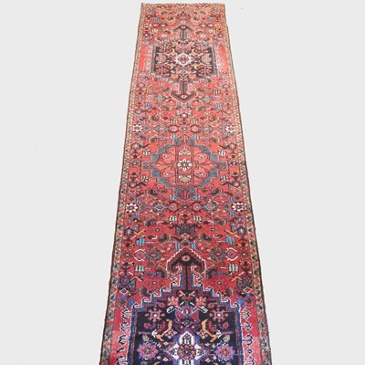 Lot 441 - A Persian hamadan runner, with a large hooked...