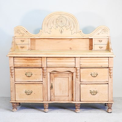 Lot 487 - A 19th century pine chiffonier, with a shaped...