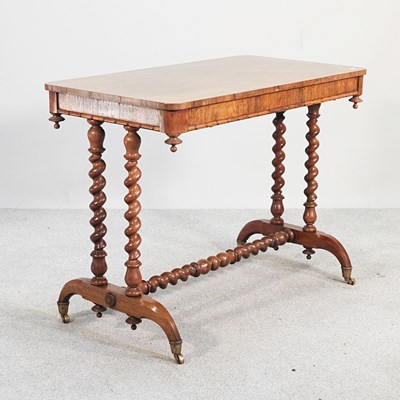 Lot 131 - A Victorian rosewood stretcher table, on...