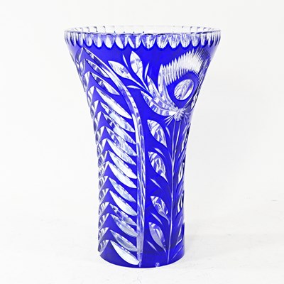Lot 724 - A Bohemian blue overlaid cut glass vase, of...
