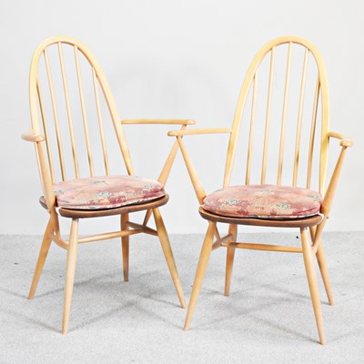 Lot 720 - A pair of 1970s Ercol light elm hoop back...
