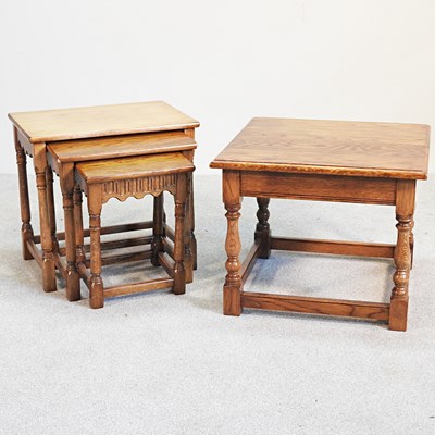Lot 192 - An oak coffee table, 56cm wide, together with...