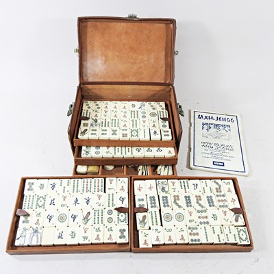 Lot 158 - A mahjong set, with bone and bamboo tiles, in...