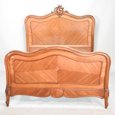 Lot 125 - An early 20th century French walnut double...