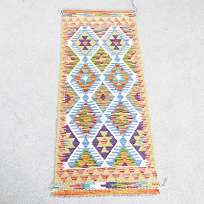 Lot 564 - A Persian kilim runner, with all over coloured...