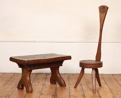 Lot 501 - A rustic elm coffee table with a spinner's...