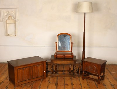 Lot 524 - An oak linenfold blanket box, together with...