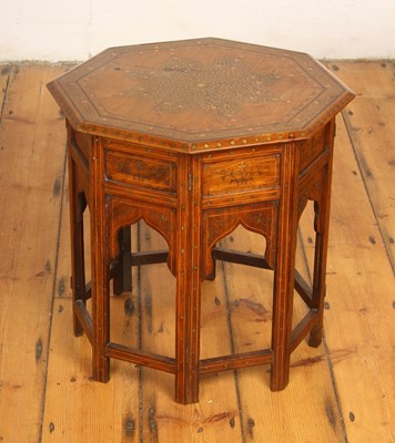 Lot 470 - An Anglo-Indian octagonal brass and copper...