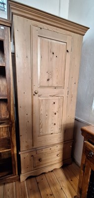 Lot 466 - A pine single wardrobe